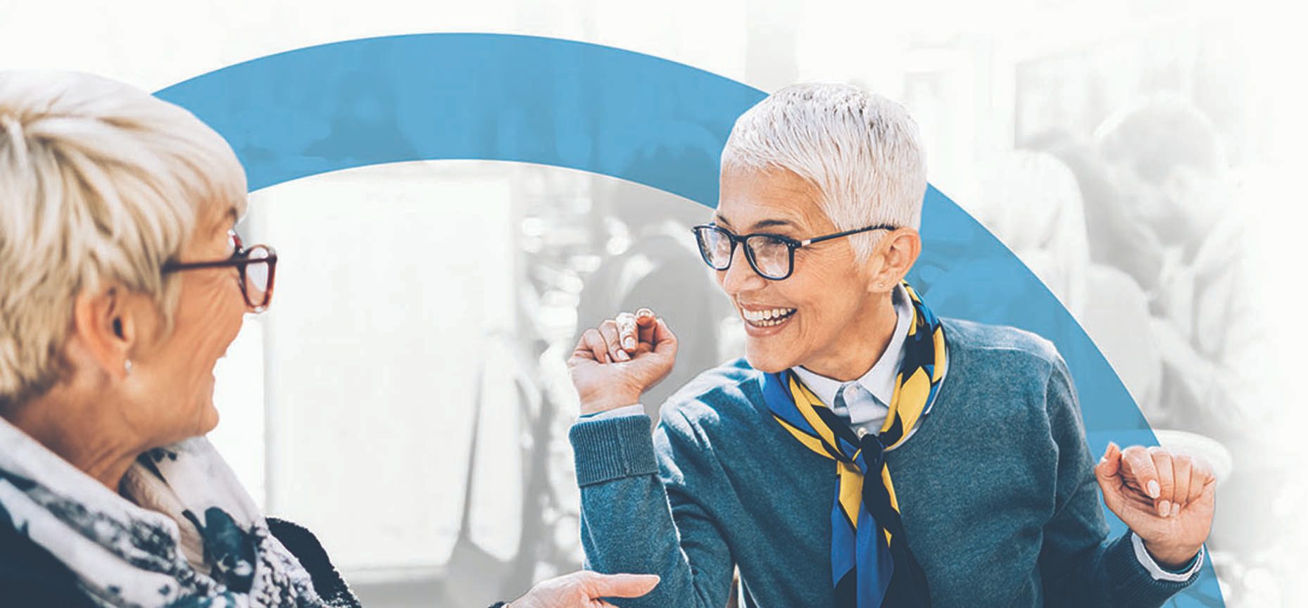 Two mature women having lunch at a cafe
