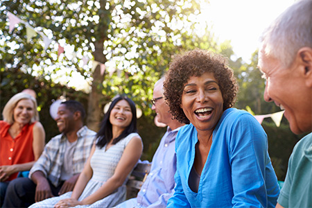 A group of people smile together